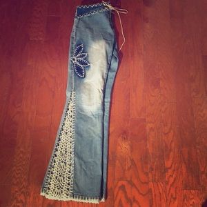 Boho inspired, crochet detailed boot cut jeans